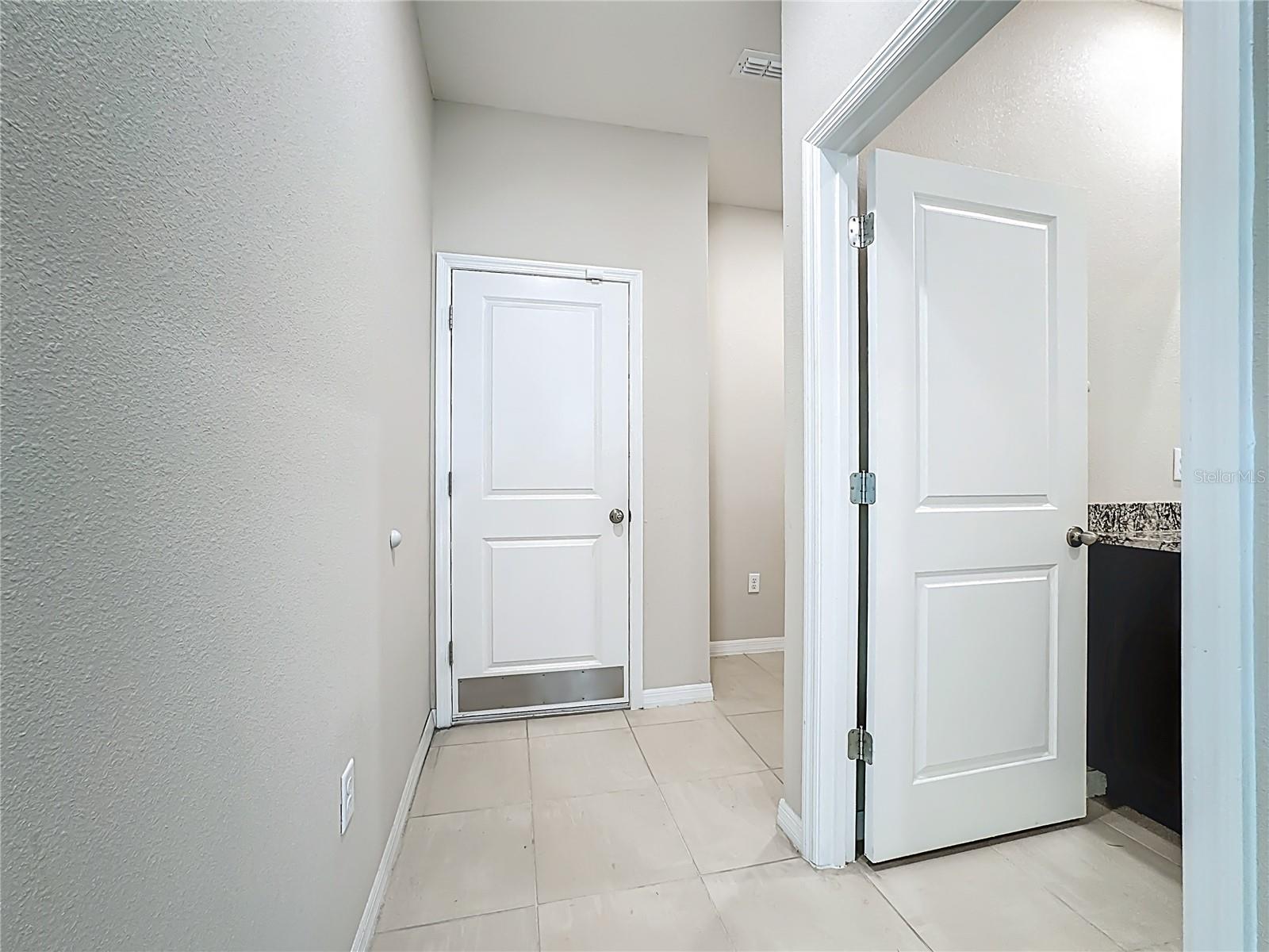 To the Right of the Garage Door is a 5'x5' Mudroom