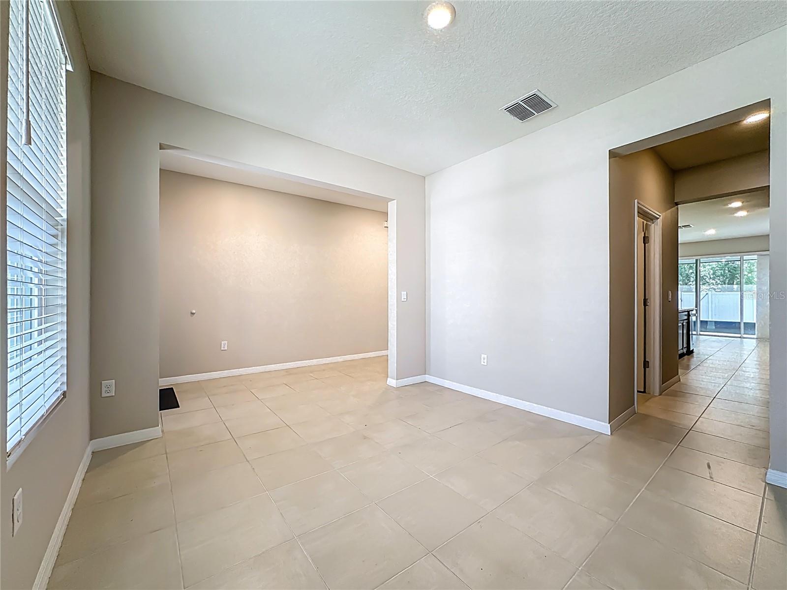 Hall to Right of Dining Room Contains Pantry and Butler's Pantry