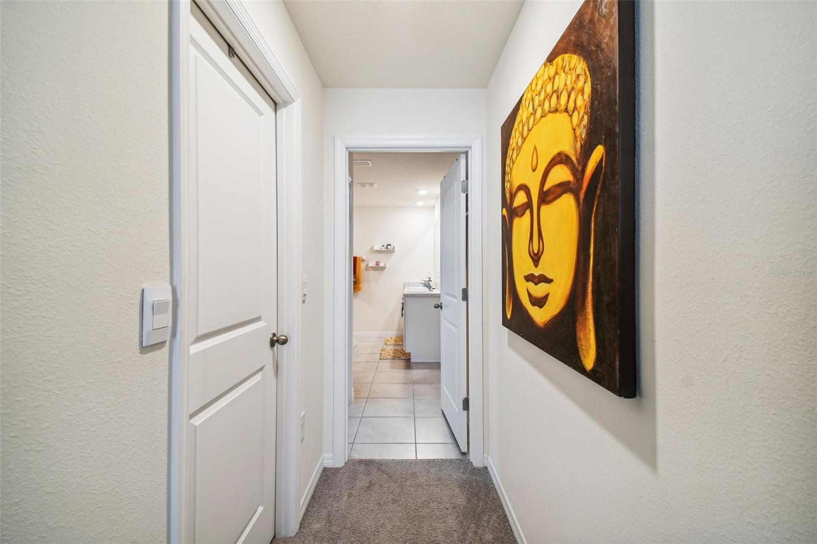 Primary hall to bath