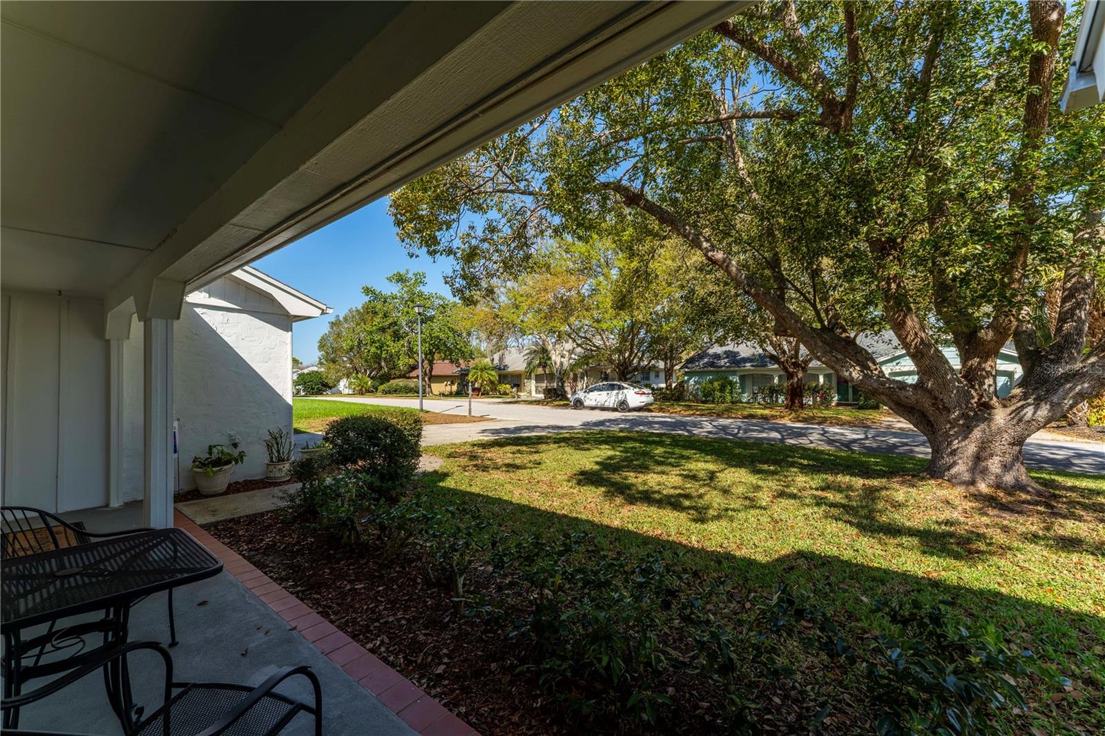 Covered front entry extends your living space outdoors-ideal for relaxing while enjoying the home's serene setting for the morning coffee or the late evening ice tea.