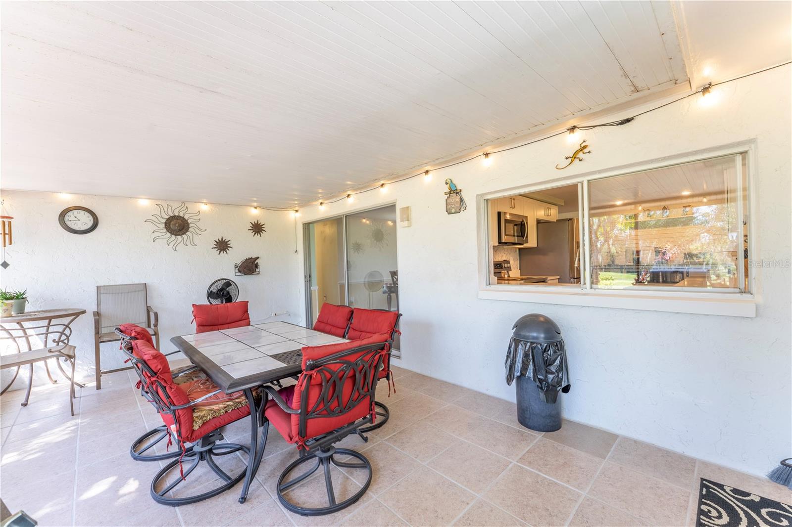 While enjoying the nighttime lights that adorn the Lanai, you also have access from the kitchen to serve meals or popcorn while playing a game of cards.