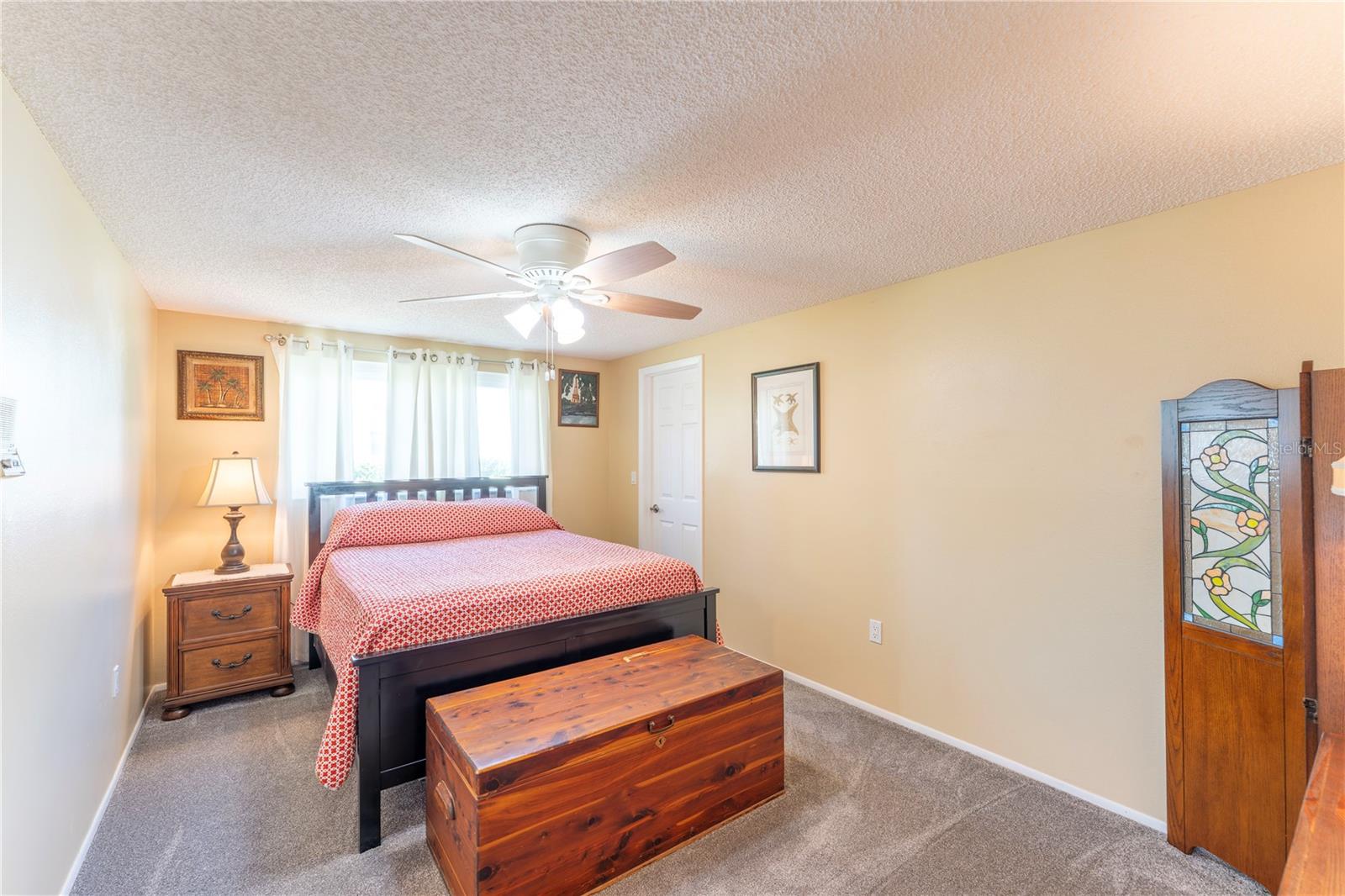 Large second bedroom with walk in closet.