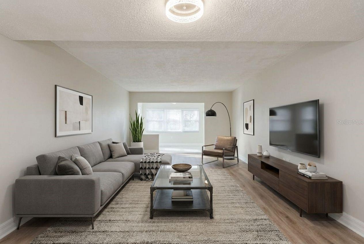 Spacious living room with calming coastal tones and natural light