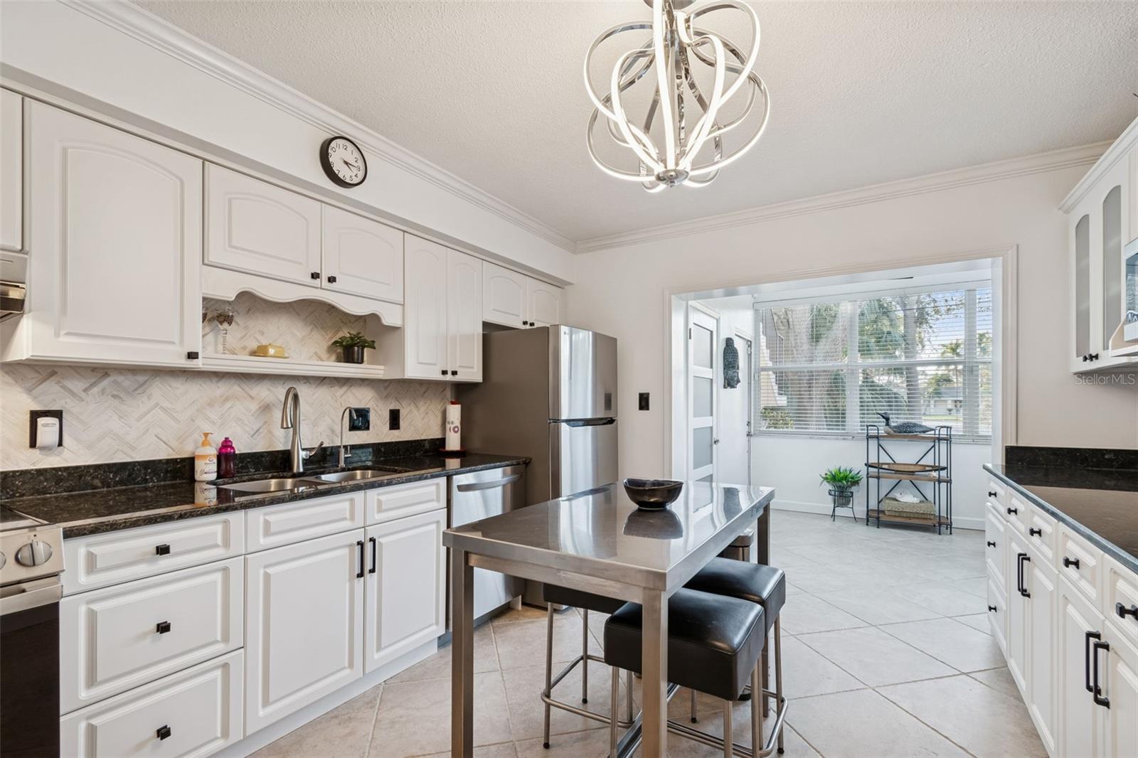Kitchn with view of Sun Room/Office Area