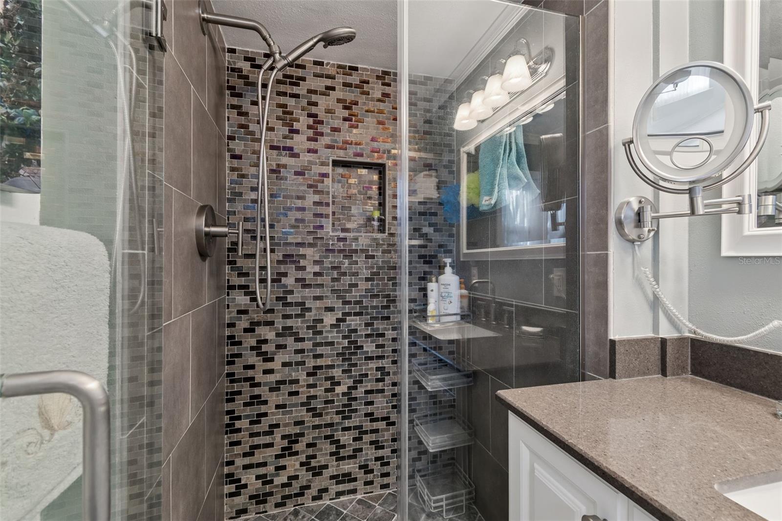 Primary Bathroom with Beautifully Tiled Shower