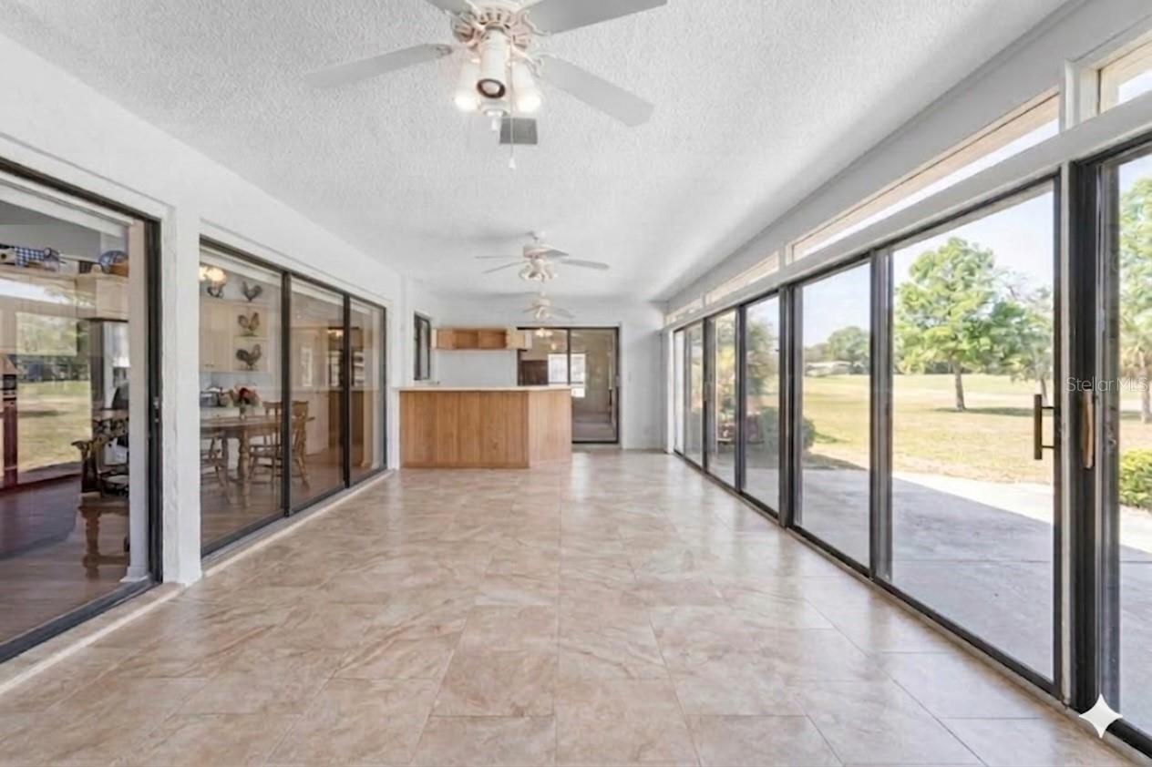 Enclosed Lanai off of Living Room Virtually Altered