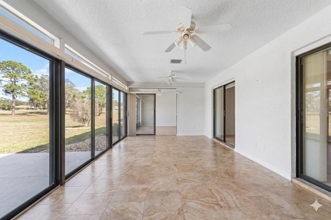 Enclosed Lanai off of Living Room Virtually Altered