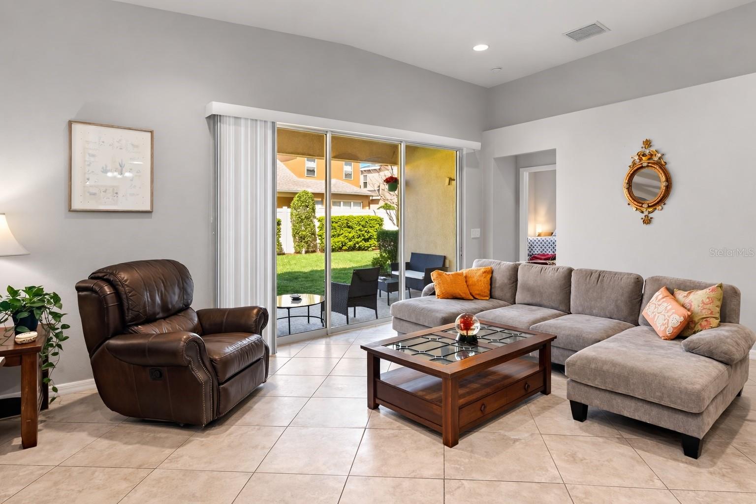 Living area with access to the patio