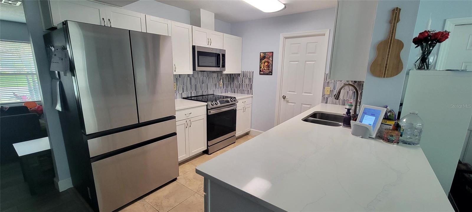 Kitchen with beautiful quartz cabinet tops