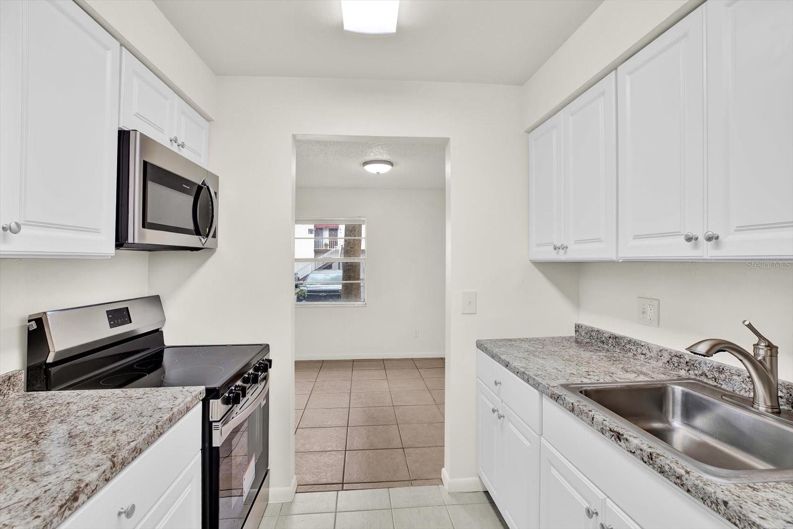 9130 TUDOR DR #M105, TAMPA, FL, 33615