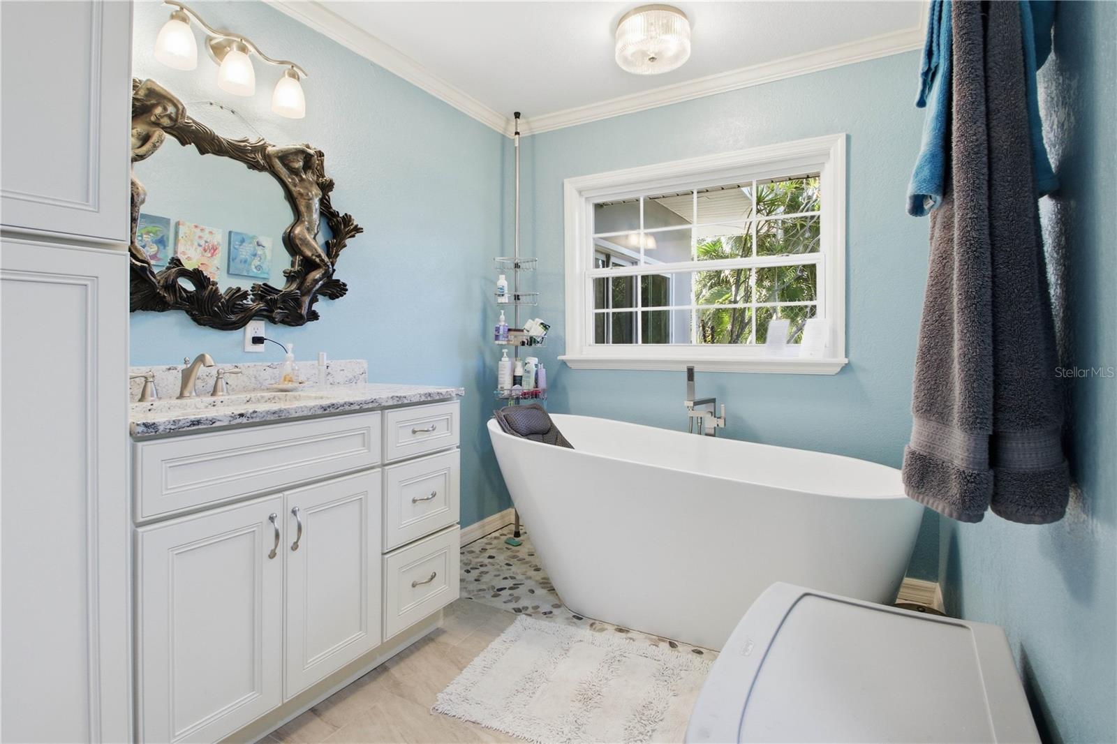 Can you see yourself soaking in this tub after a long day? This also includes lots of storage.