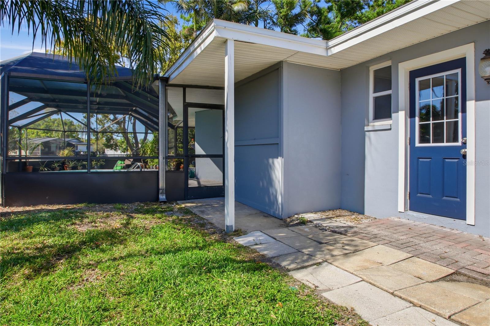 The blue door is to the mod room / laundry area