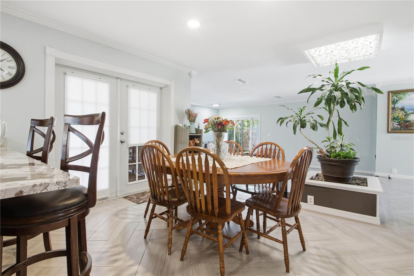 Between the kitchen and the family room is a more formal dining area.