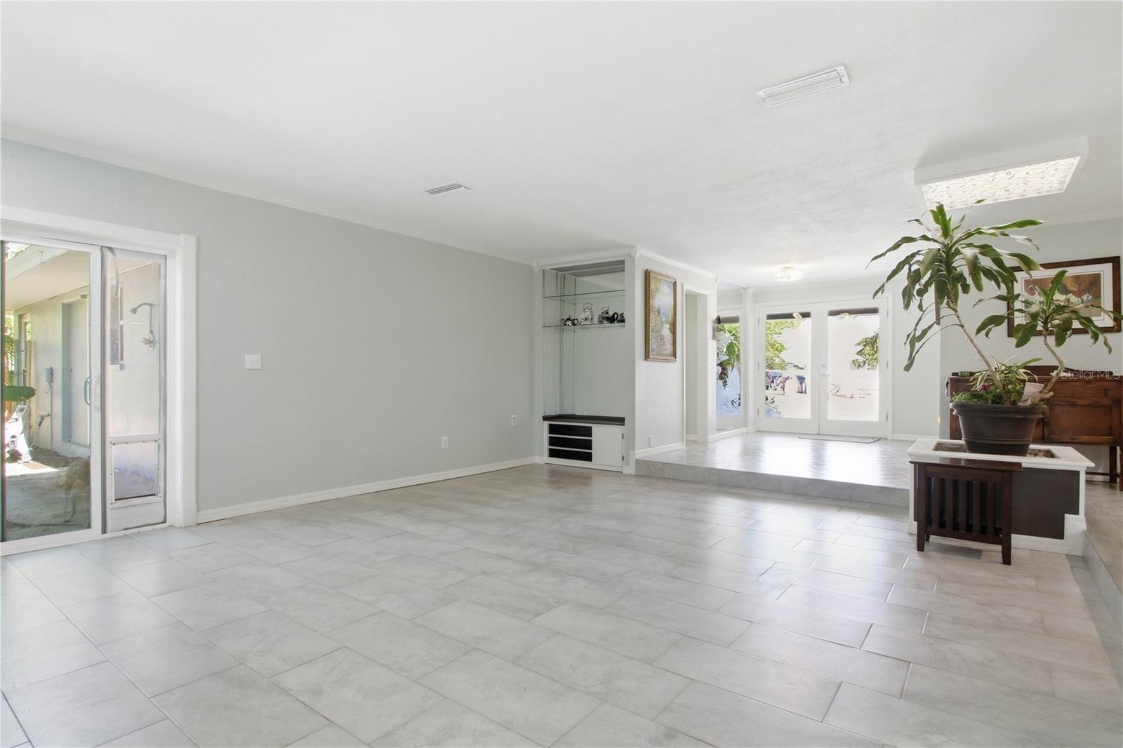 And one final view of the family room. Have pets? Note the doggie door on the left that leads to the back yard.