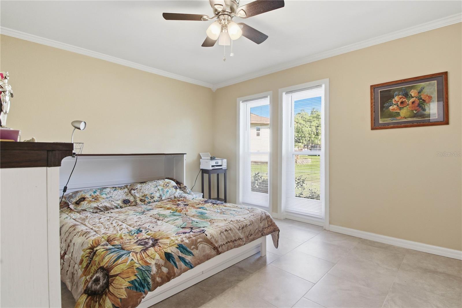 First bedroom on the right is spacious and has a spectacular view of the massive and well manacured front lawn with plenty of natural light.