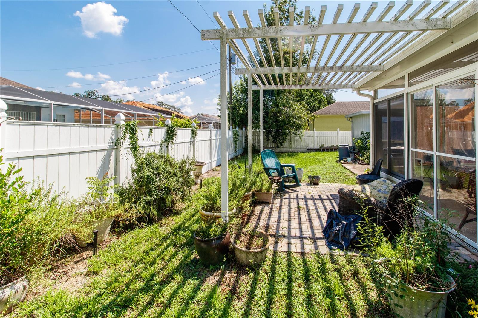 Fully Fenced Backyard. Vinyl Fencing.