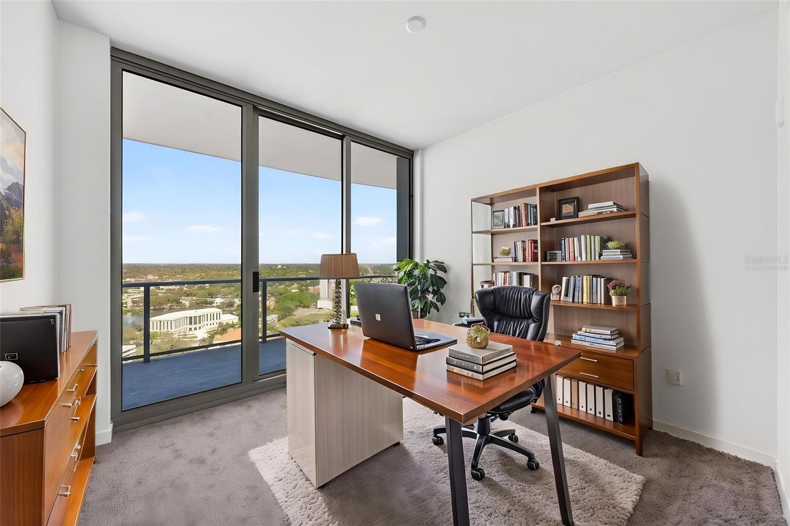 Virtually Staged Guest Bedroom #2 shown as an office instead of bedroom.