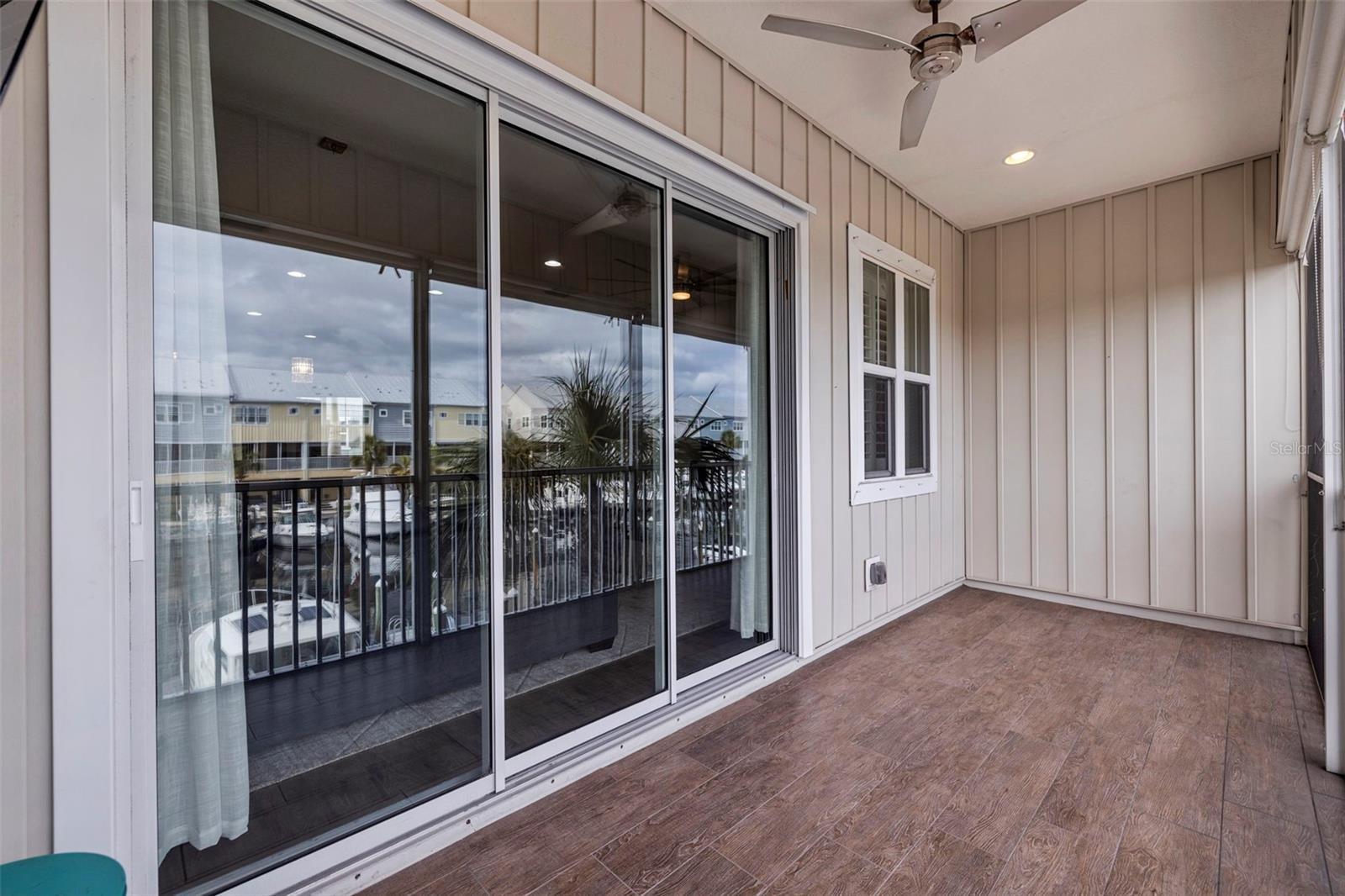 Upstairs screened balcony