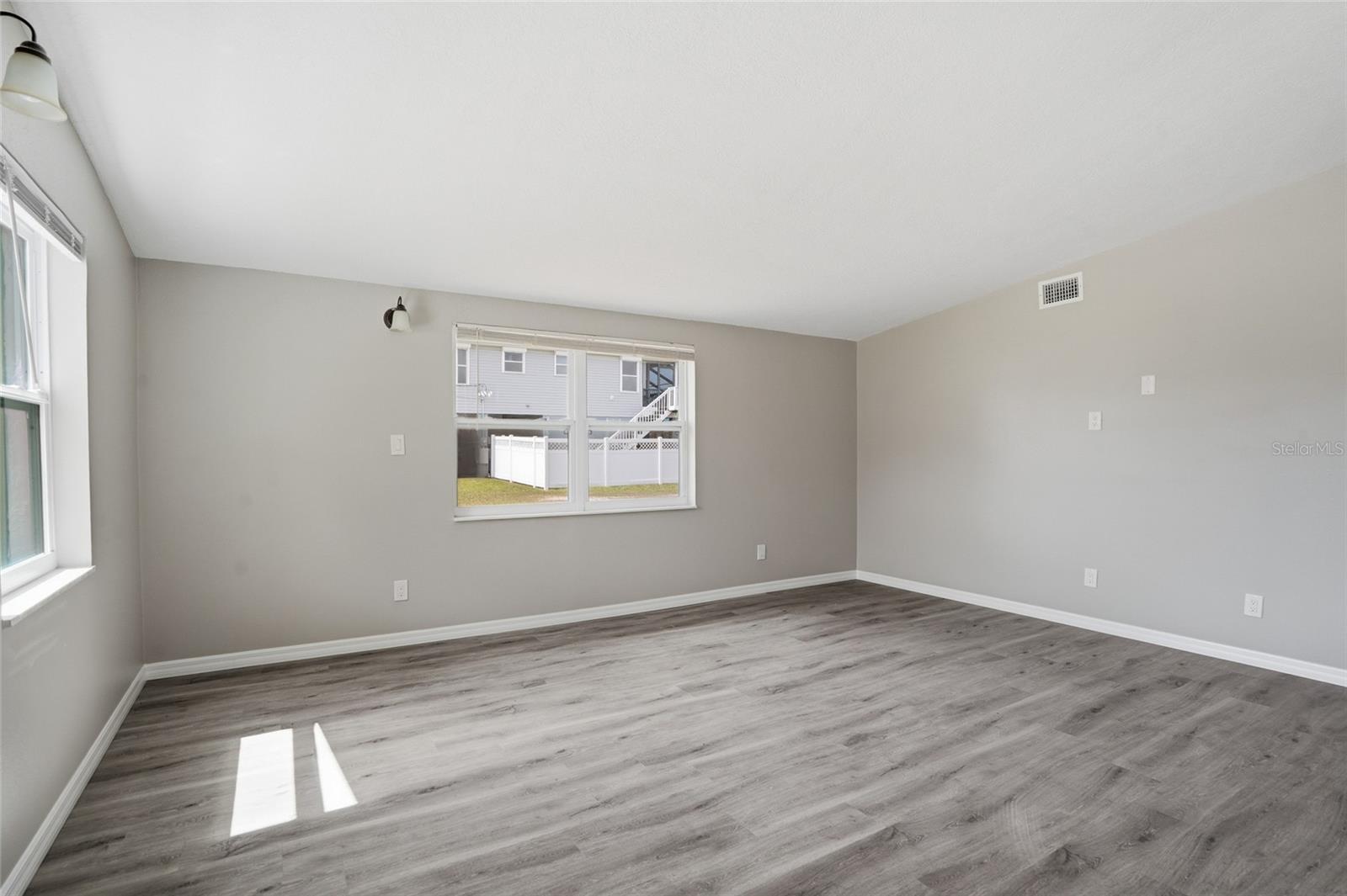 karge living area with tons of natural light