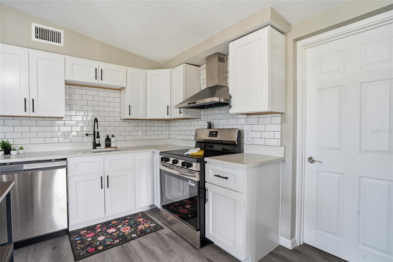timeless subway tile backsplash with dark grey grout