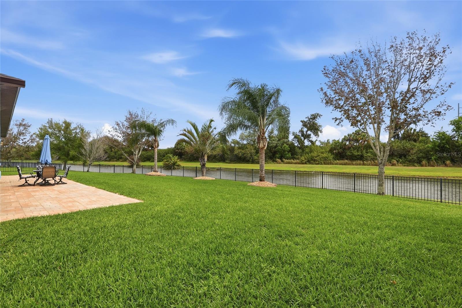 Backyard with Pond & Convervation View