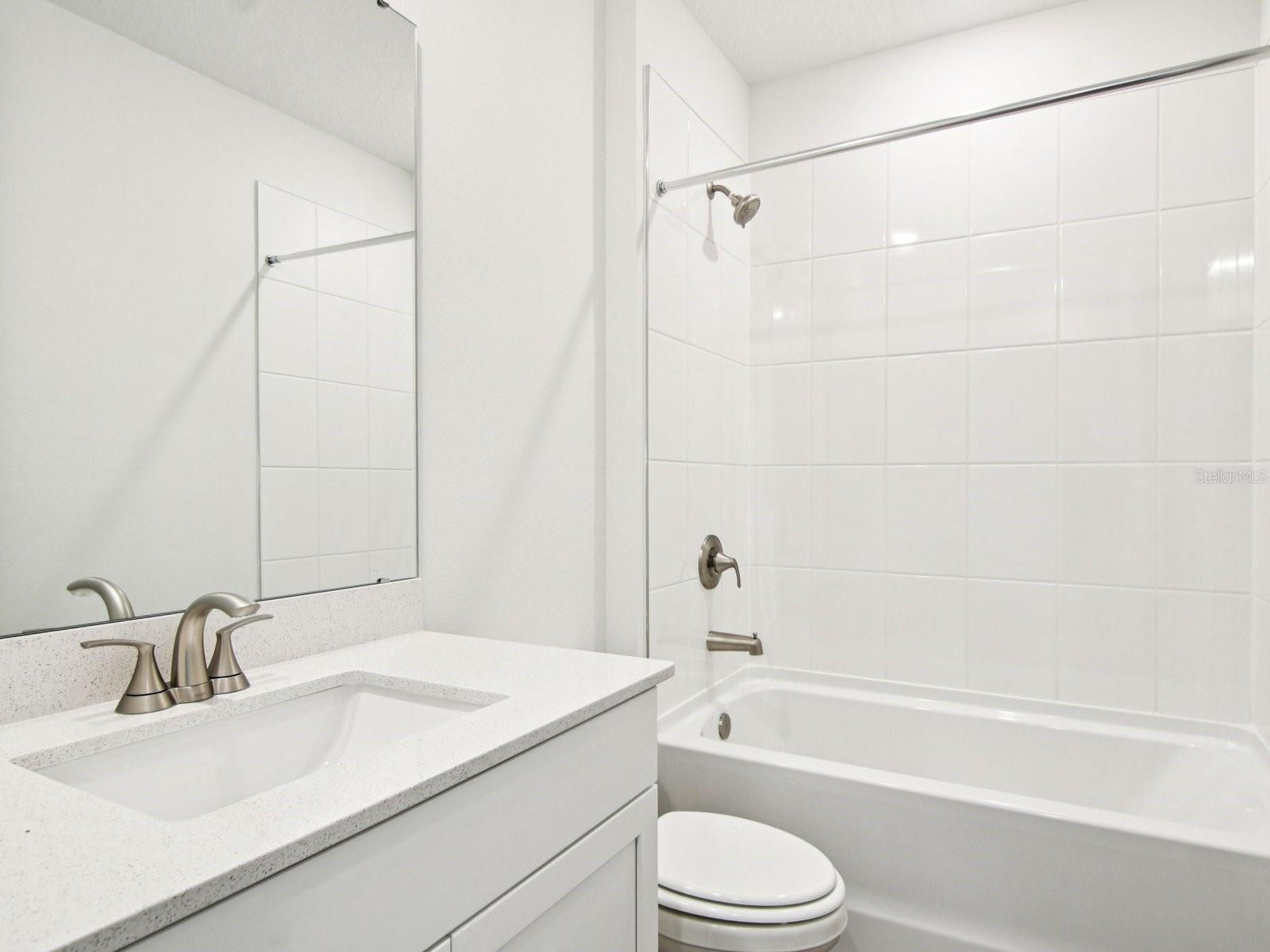 Interior photos are not of the actual home but are photos of the builder home with the same floorplan with similar interior finishes and features.