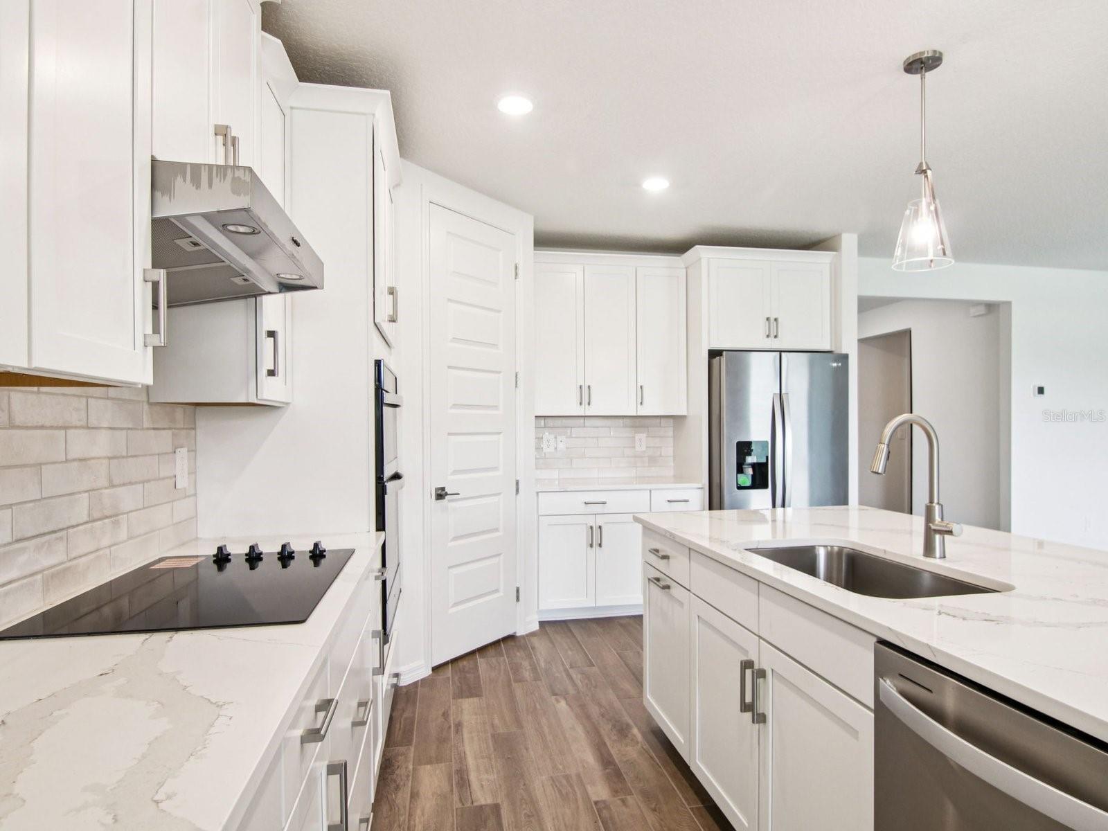 Interior photos are not of the actual home but are photos of the builder home with the same floorplan with similar interior finishes and features.