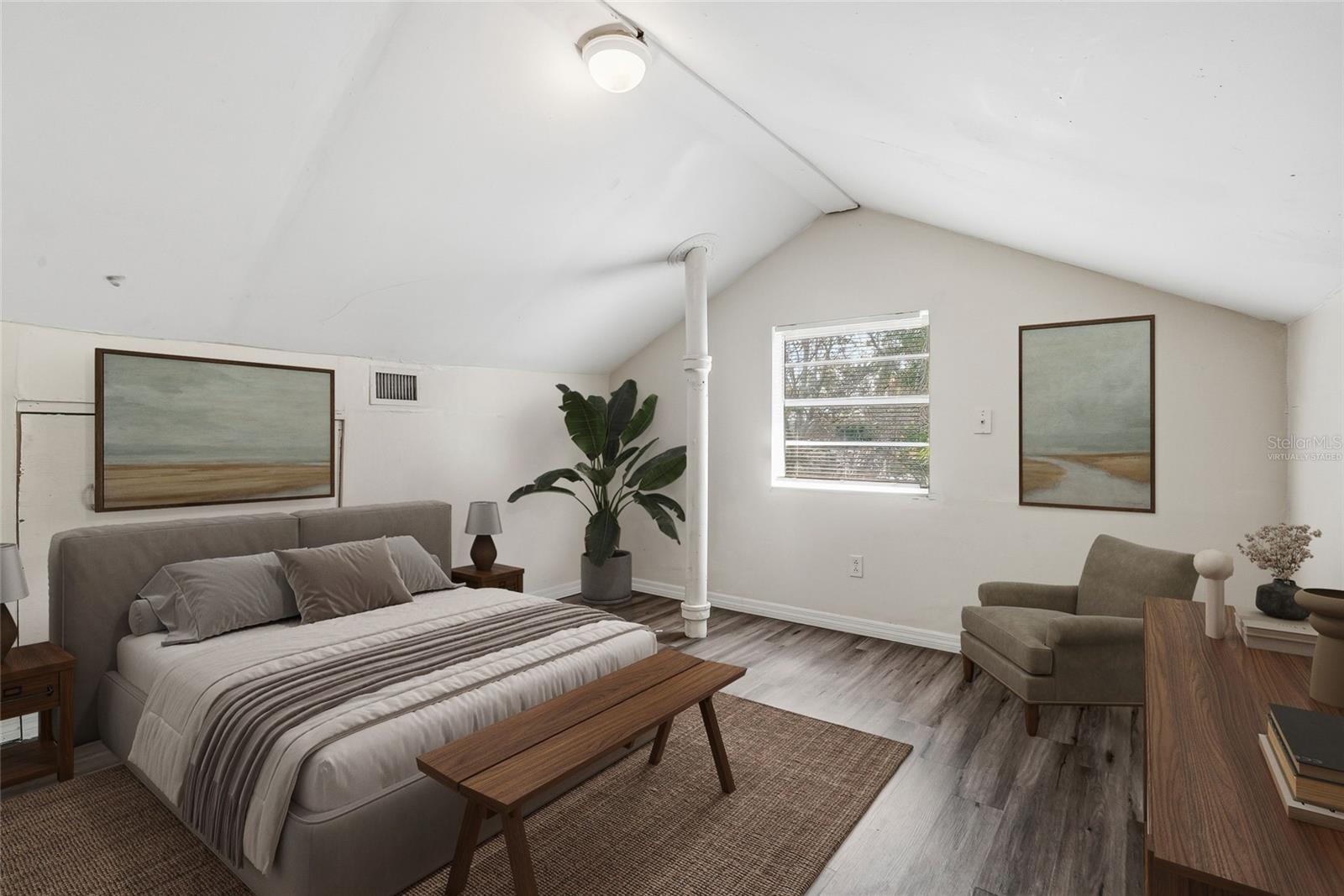 Vaulted Ceilings in this fabulous Bedroom.  (Virtually Staged)