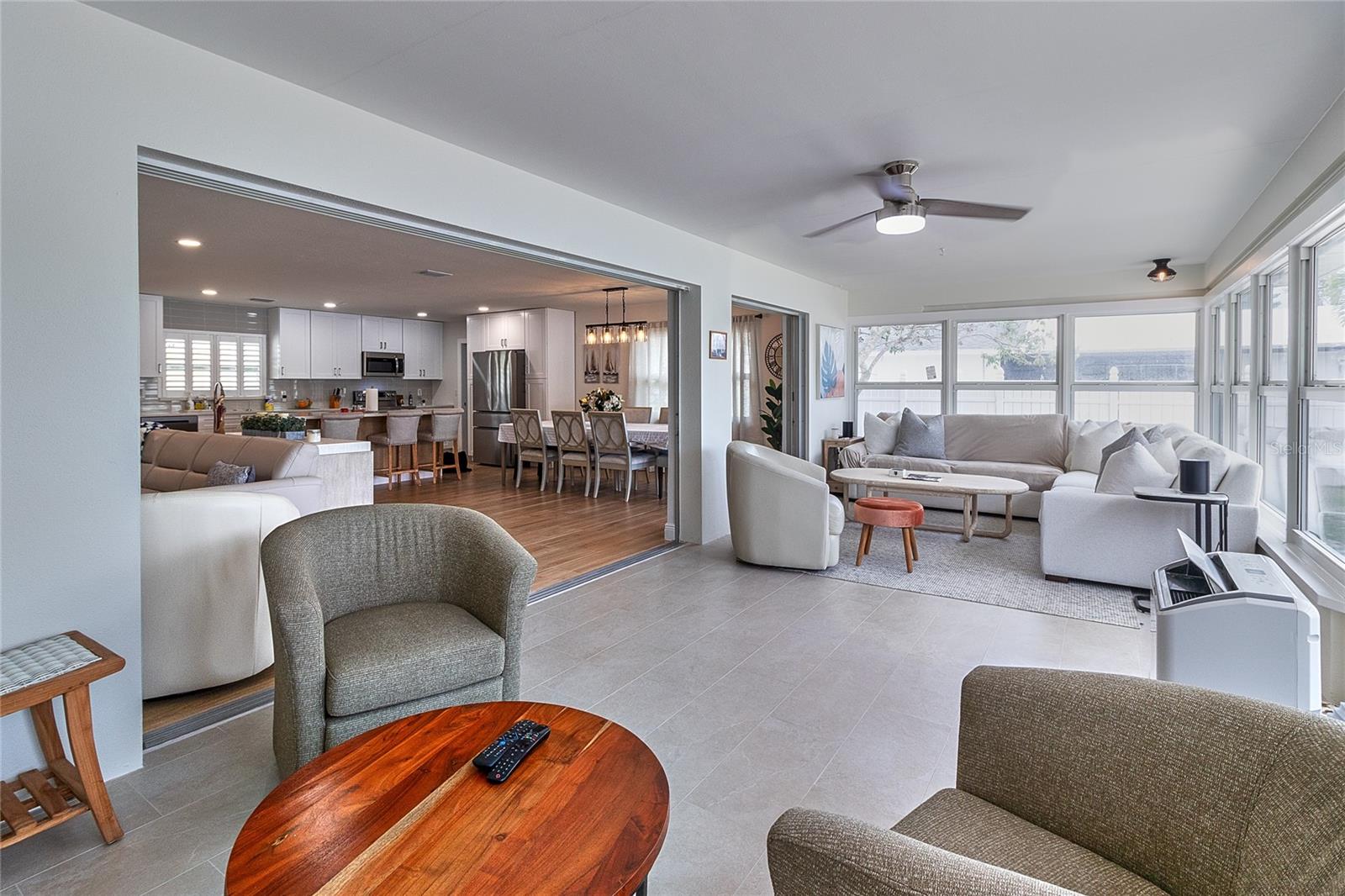 Sliders open to Sunroom