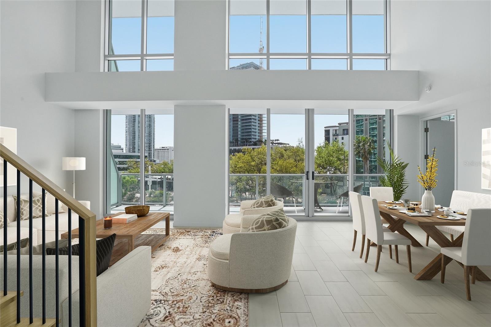 Welcome to the heart of downtown St Petersburg, Florida in a two story city home at 400 Central! A solid wall of expansive windows and extended balconies!