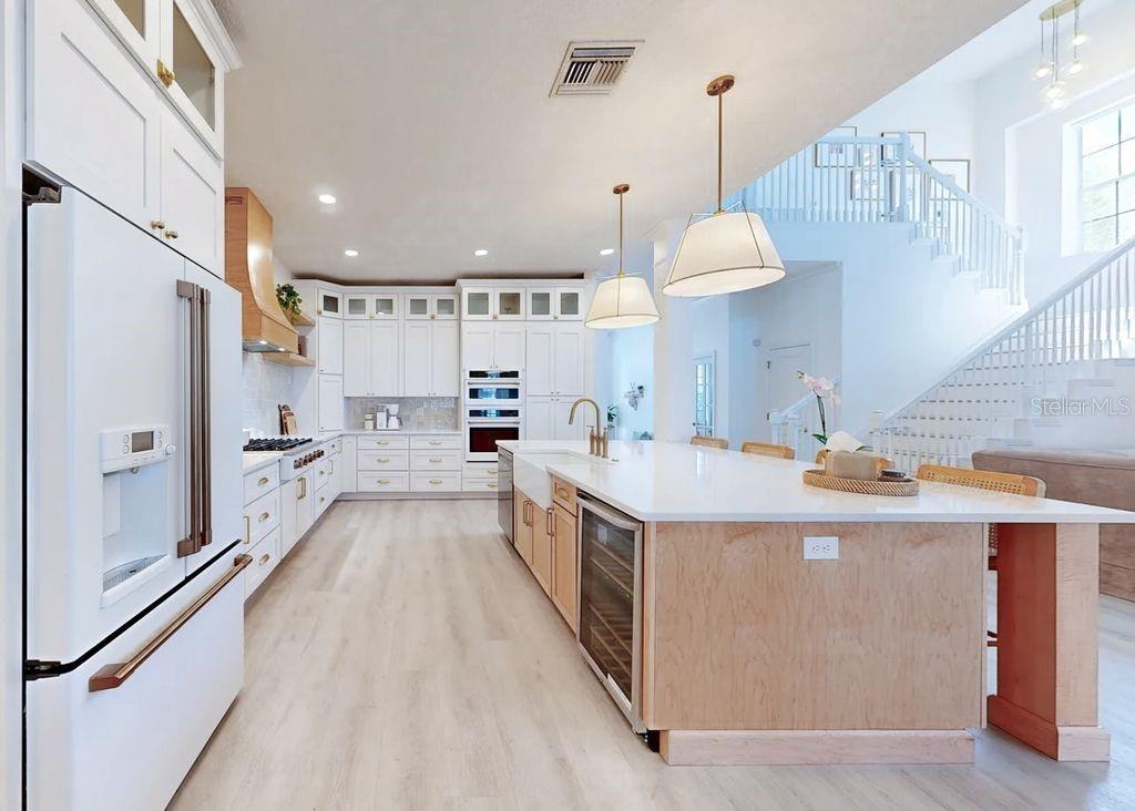 Kitchen island with wine refrigerator