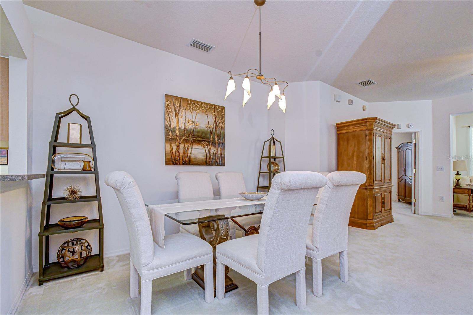 This dining space is open to the living room.