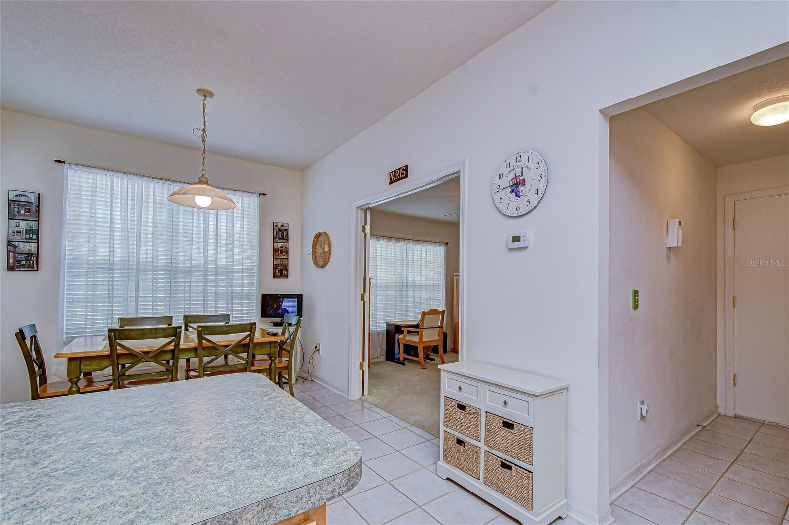 There is a little hallway leading to the garage from the kitchen.