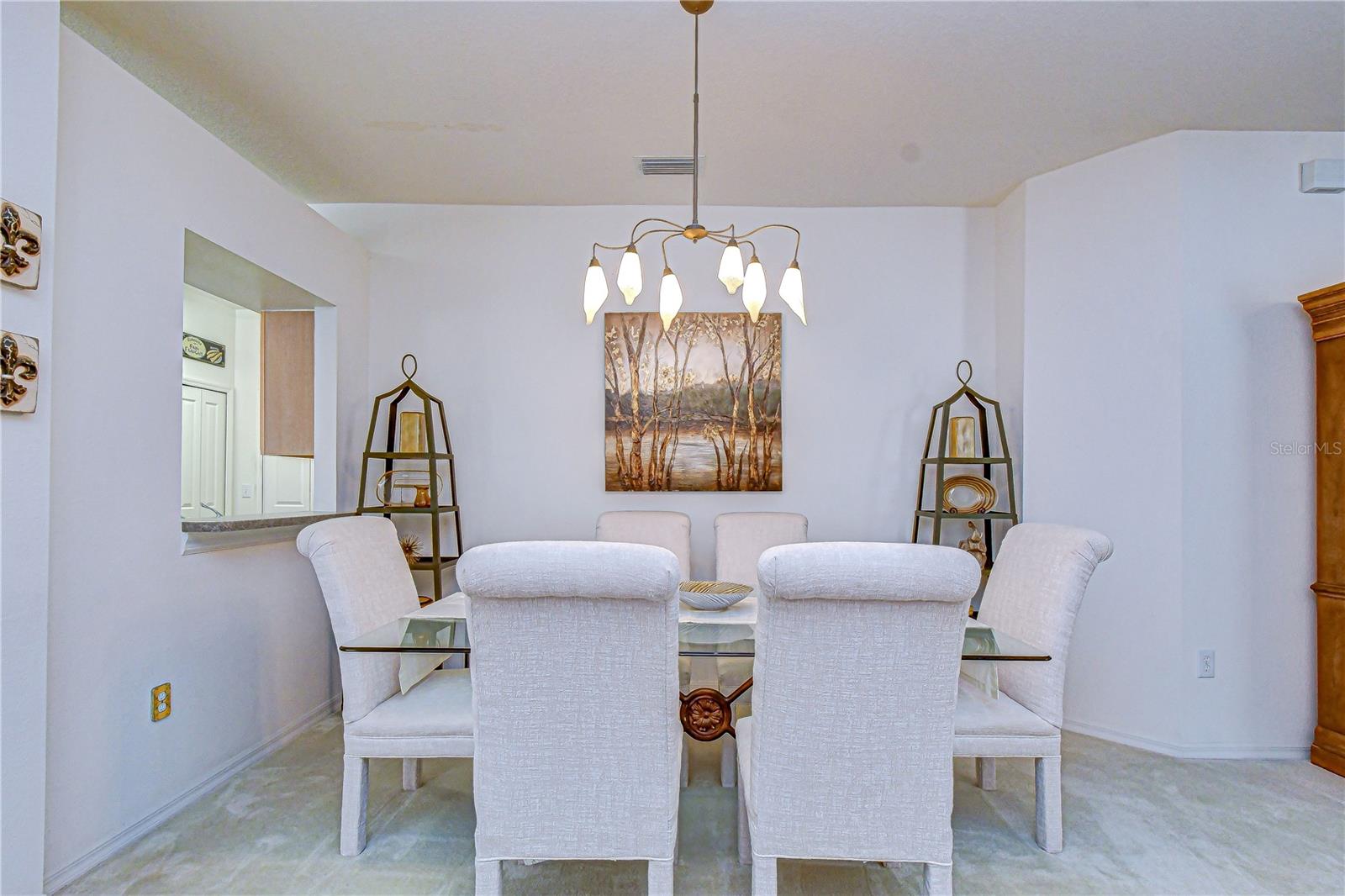 The barely used dining with a pass through to the kitchen.