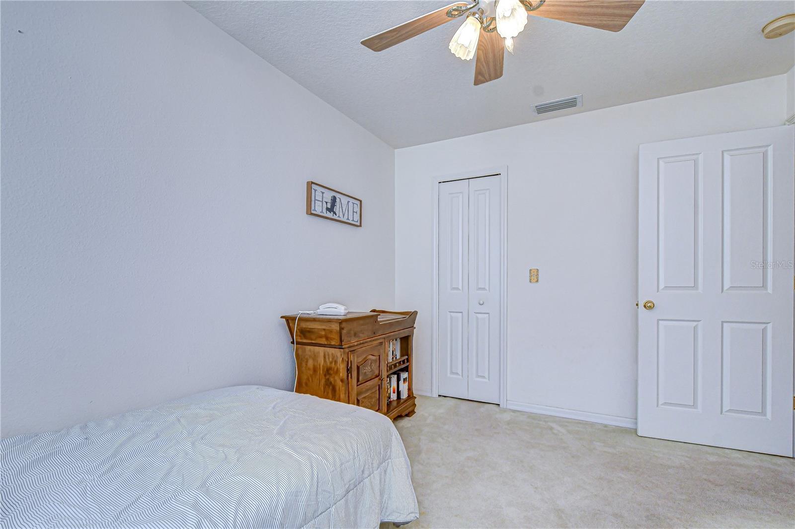 The private 2nd bedroom has a large walk-in closet!