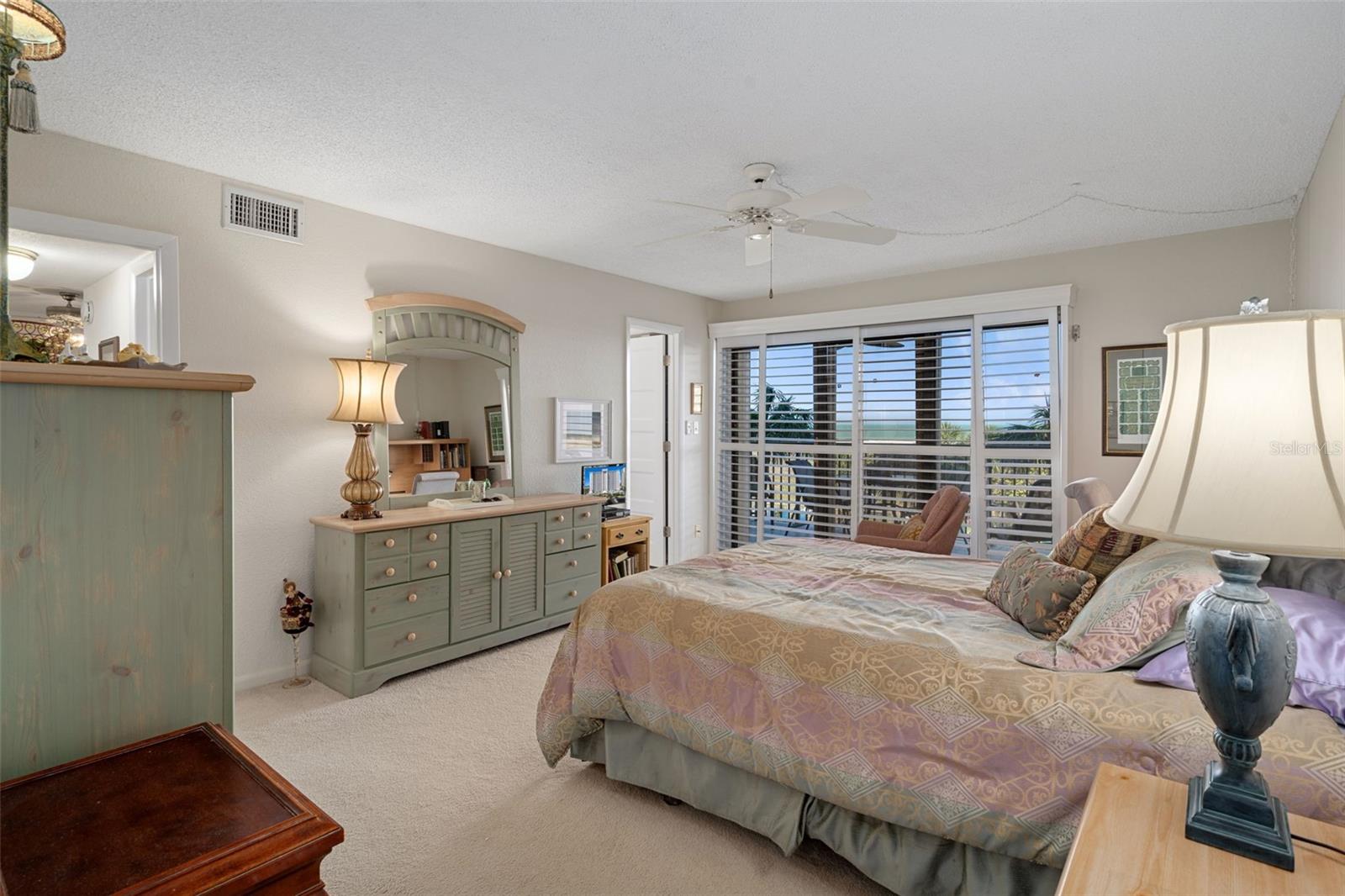 Sliding plantation shutters close over the sliding doors when needed