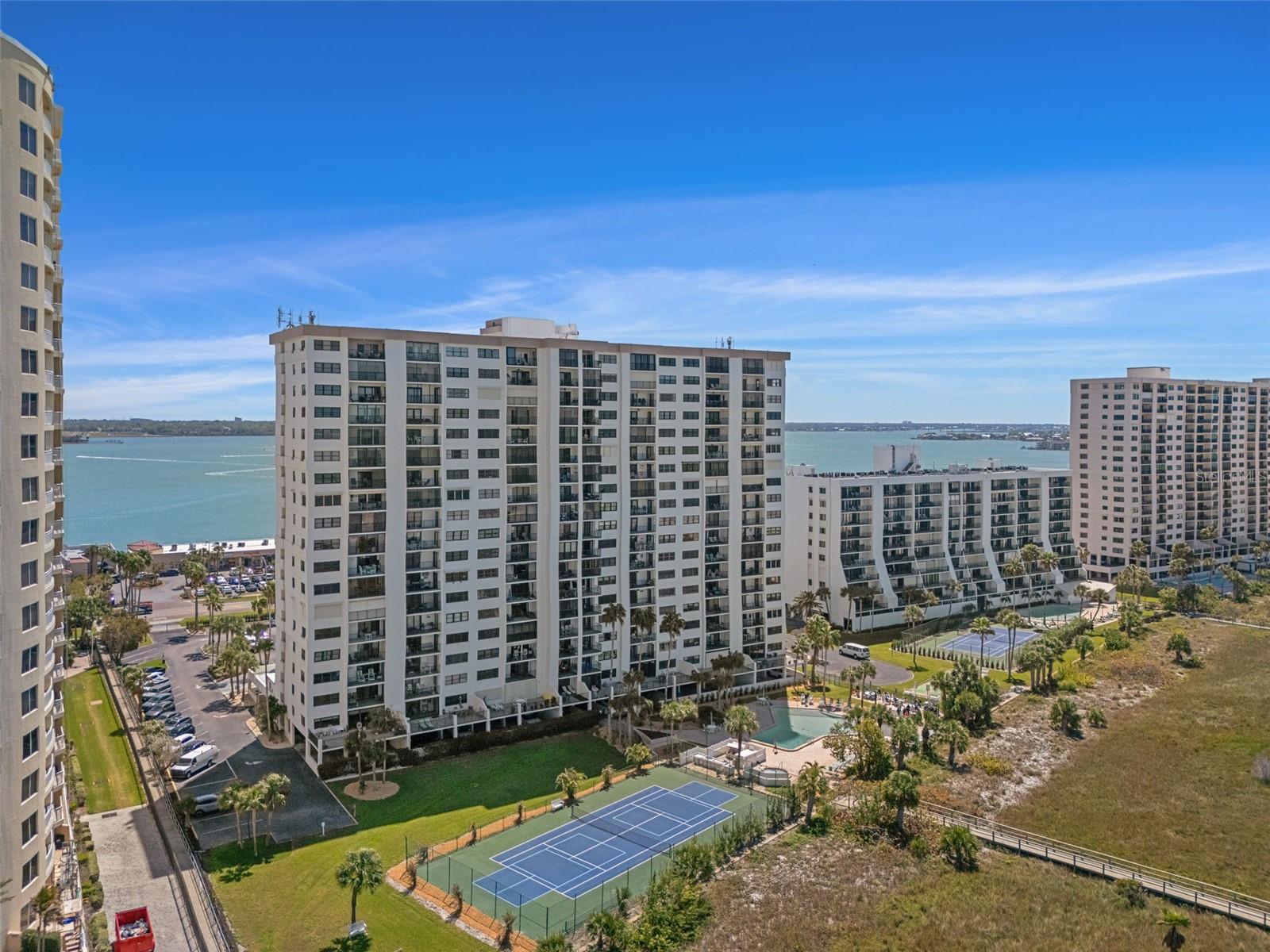 Landmark Tower One features a pool, spa, tennis & pickleball courts, a swing set and a boardwalk to the sugar sand beach!