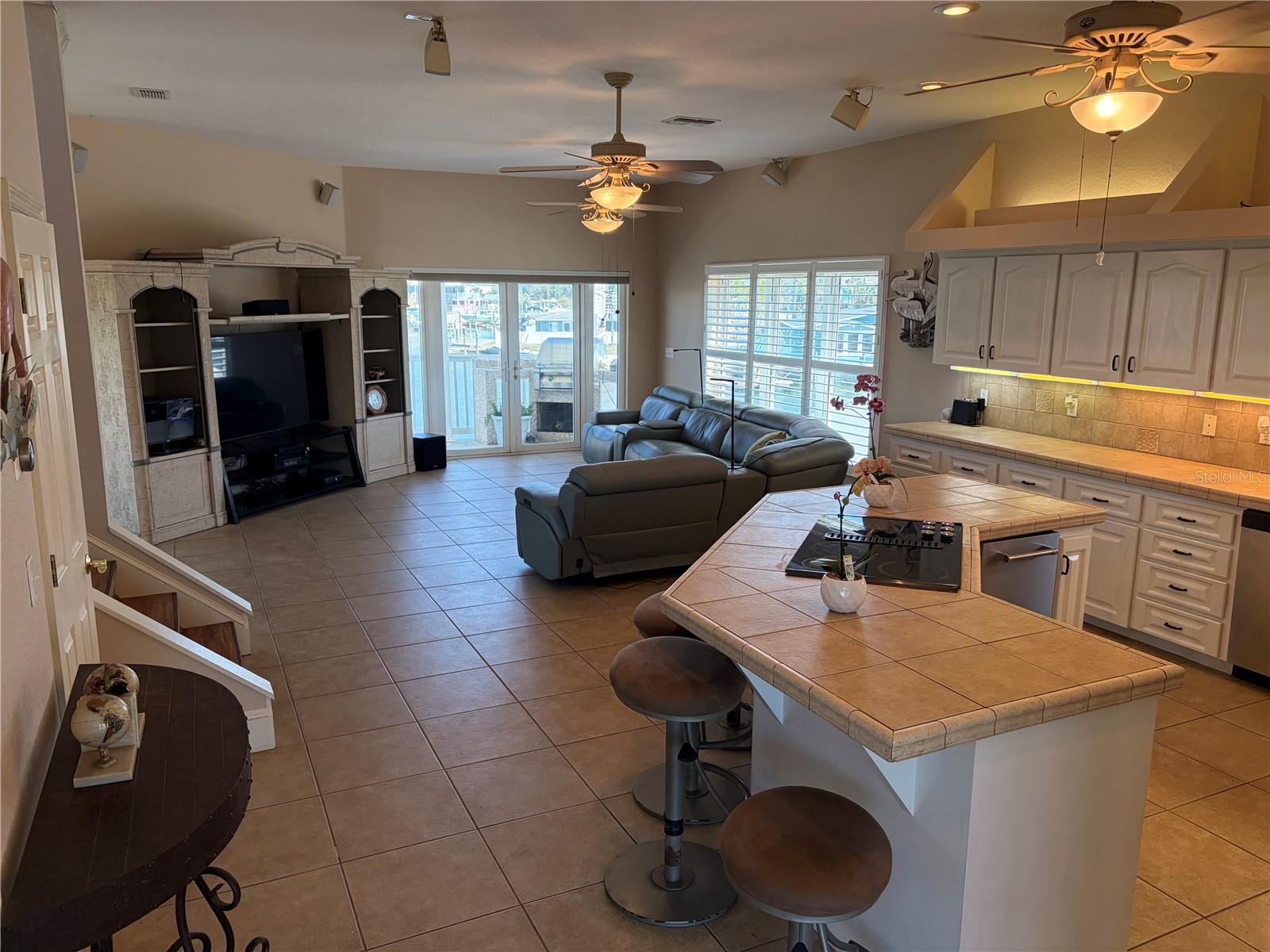 open concept of kitchen, office and living room