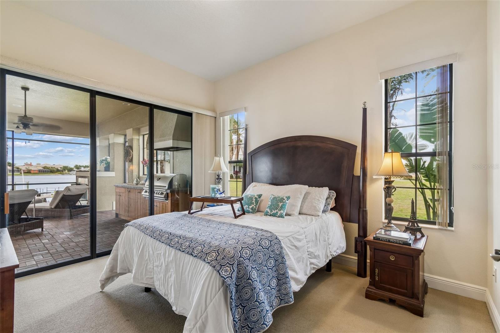 Bedroom 3. Enjoy view of pool and water from your bed.