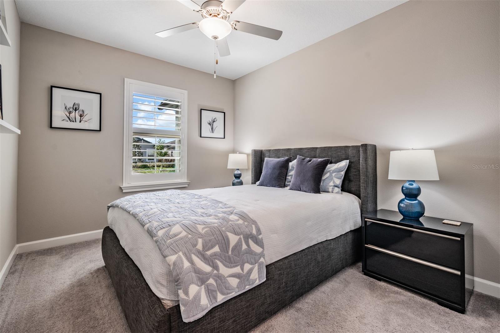 Guest bedroom with plantation shutters!