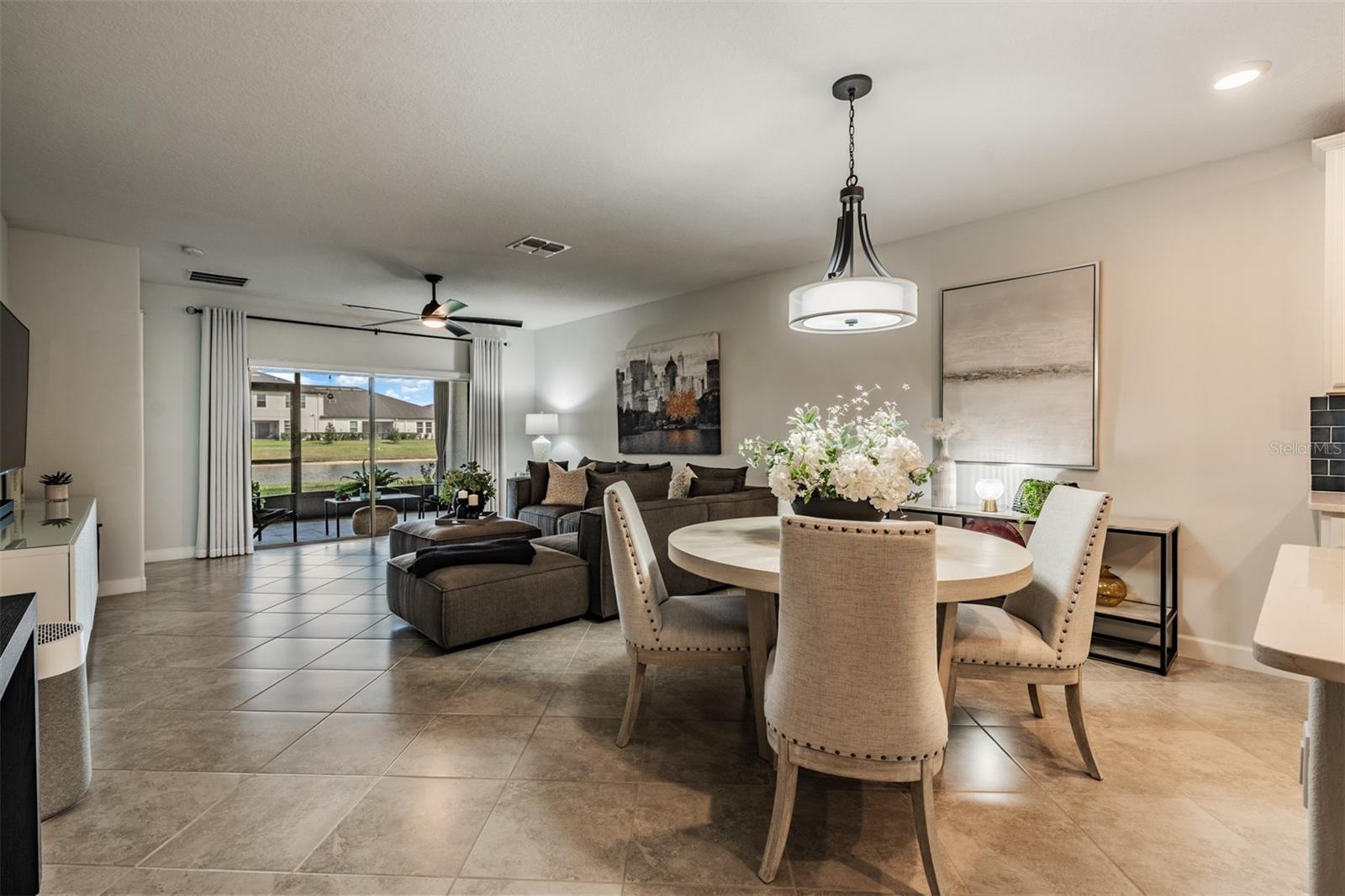 Dining area OPEN to Great room with pond views!
