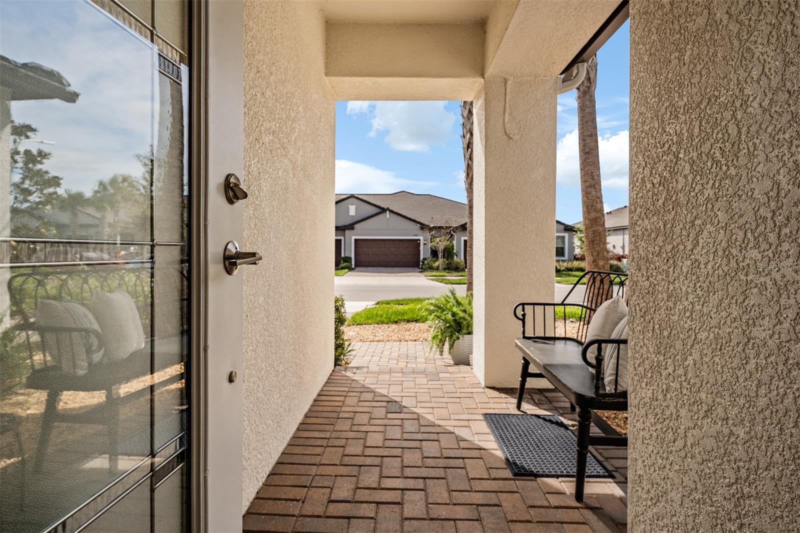 Front door view of covered entry
