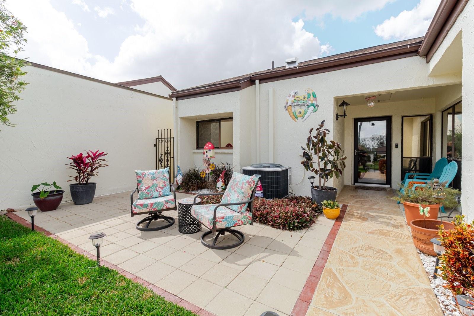 Front Door with porch/sitting area