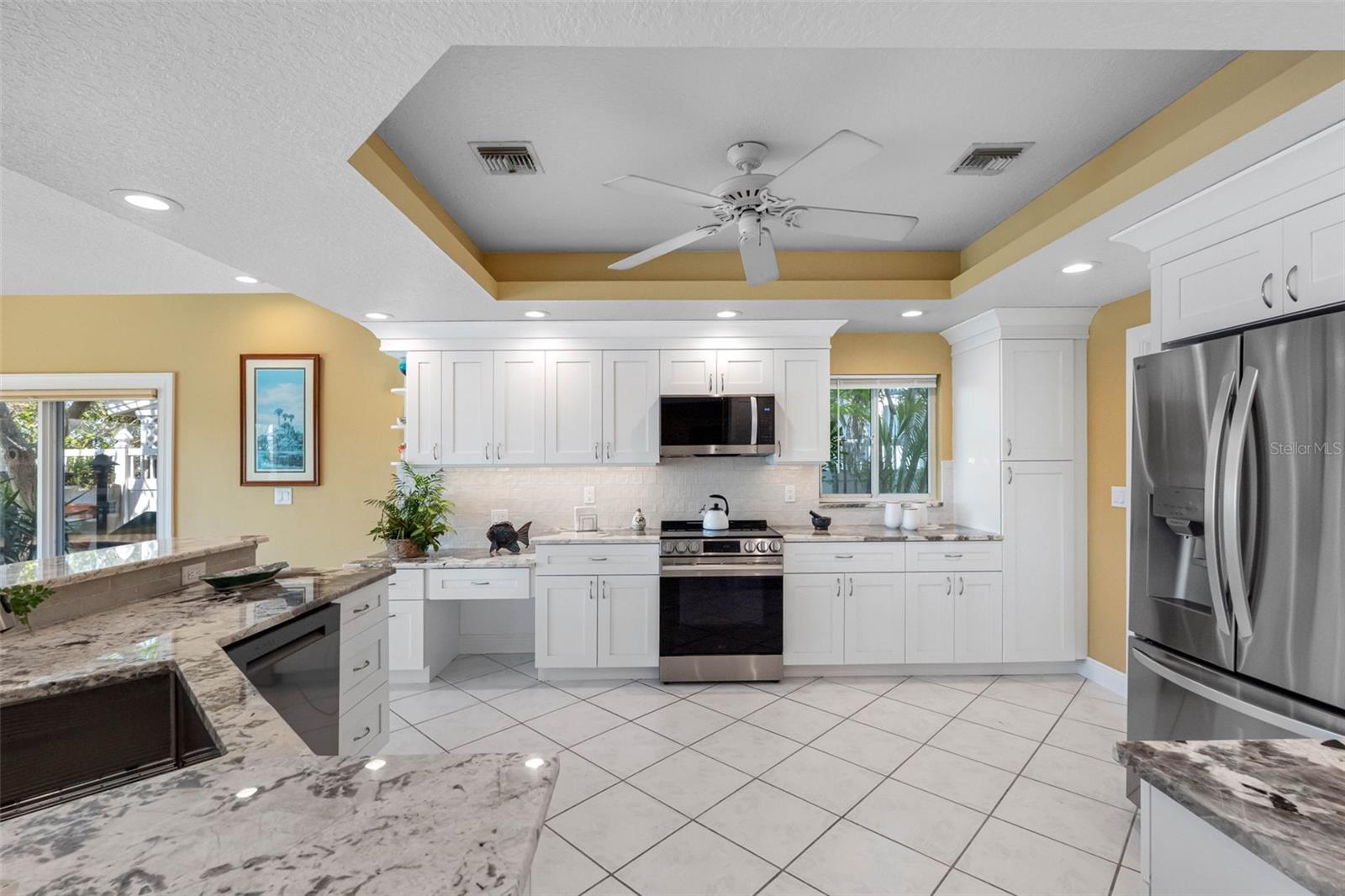 Recently renovated kitchen with all new stainless steel appliances, new cabinets and counters.