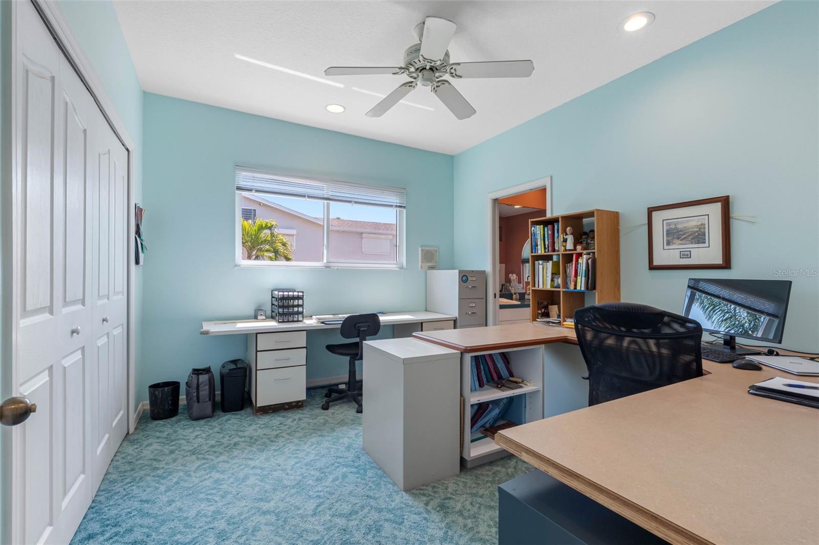 Second upstairs room, currently being used as an office.