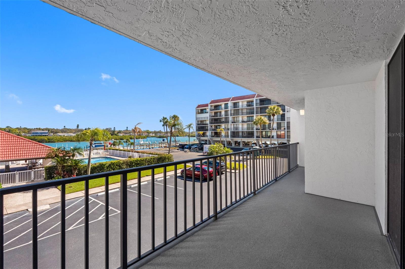 Phot taken around 12 noon. Sun Directly overhead. Unit #204 has nice views of boats going by without the noise. People enjoy  lower Floors which allows them one flight of Stairs to go Up or Down - Elevator becomes an option.