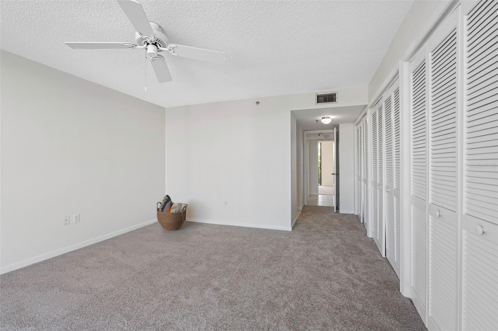 ... Primary Bedrom Suite - Refer to Floorplans.. 13.4 X 23.11... En-Suite with Tripe Set of Closets.. There is also another 5 foot Closet in Bathroom Area. Looking in from Waterfront Balcony. 13.4 X 23.11