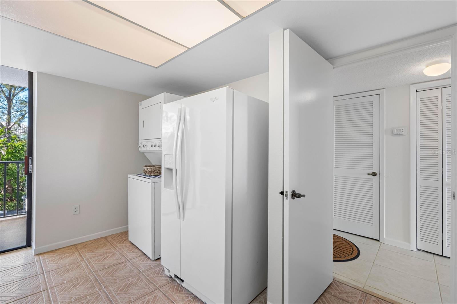 ... Large 10.5 X 14.4 Kitchen ... New A/C and New Water Heater in Foyer thru Panelled Doors on Left. Bifold  Door has Kit Pantry or Storage Closet.