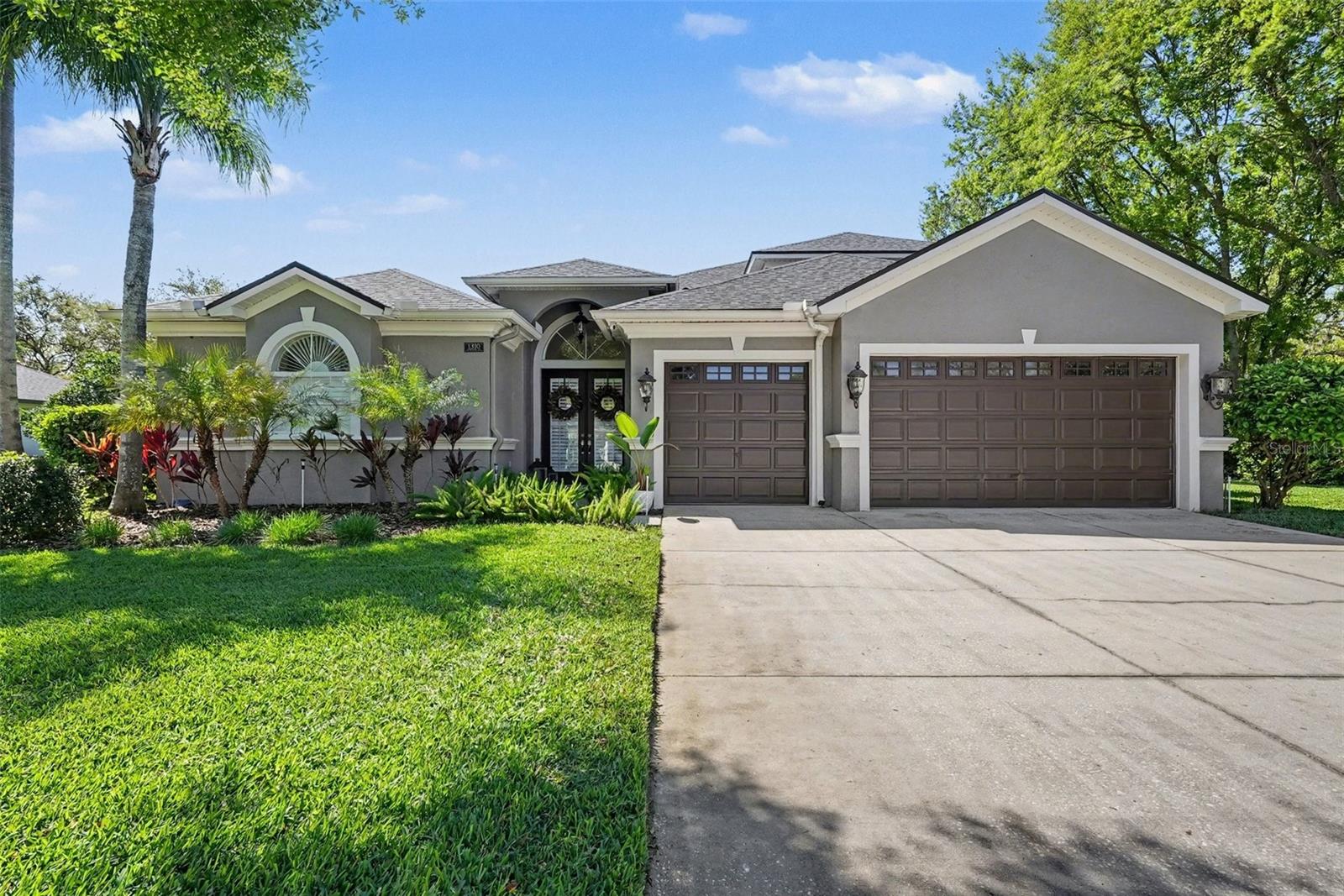 Talk about curb appeal! You'll be greeted with  thoughtful landscaping, neutral exterior paint, and a 3 car garage- all perfectly positioned on a quiet street with cul-de-sac.
