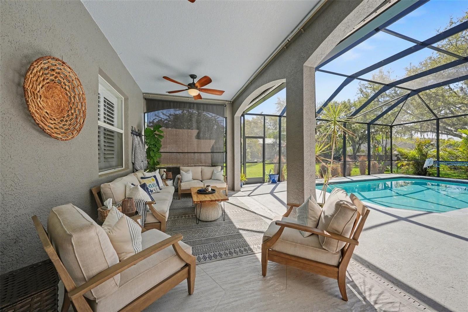 Your covered lanai with screen enclosure and sun shades allows you to enjoy the Florida outdoors year-round.